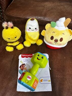 Bundle of baby toys and plushies